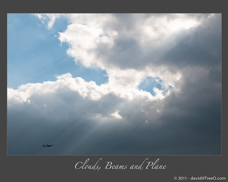 Clouds, Beams and Plane - Philadelphia, Pennsylvania - October 31, 2010