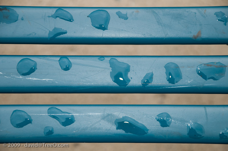 Rain Droplets on Metal Bench